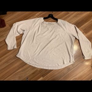 Light pink cropped long sleeve shirt